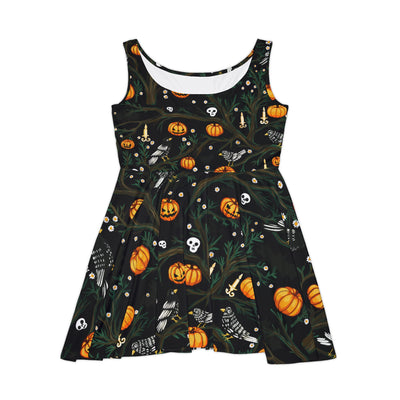 Halloween pattern featuring cute crows, skulls, bats, pumpkins, a few spiders, and some creepy tree branches, on a dress, black background